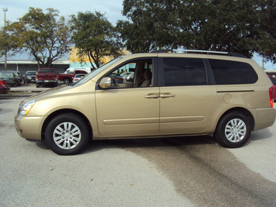 kia sedona 2011 gold van lx gasoline 6 cylinders front wheel drive automatic 32901