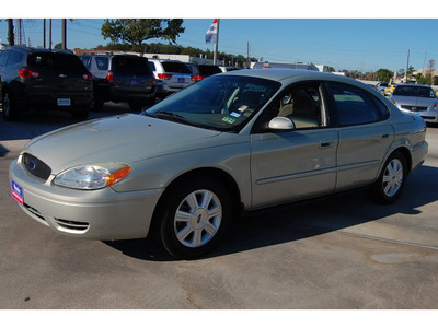ford taurus 2005 green sedan sel gasoline 6 cylinders front wheel drive 4 speed automatic 77090
