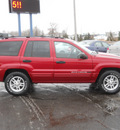 jeep grand cherokee 2004 red suv special edition gasoline 8 cylinders 4 wheel drive automatic with overdrive 55811