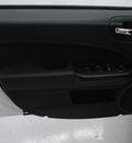 dodge caliber 2010 white hatchback sxt gasoline 4 cylinders front wheel drive automatic 91731