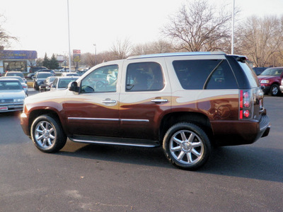 gmc yukon 2009 goldbrown suv denali awd dvd navi gasoline 8 cylinders all whee drive automatic 55124