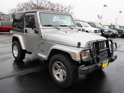 jeep wrangler 2002 silver suv sport gasoline 6 cylinders 4 wheel drive 5 speed manual 07730