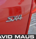 suzuki sx4 2008 red hatchback gasoline 4 cylinders all whee drive automatic 32771