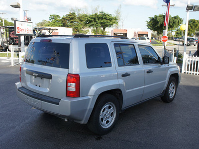 jeep patriot 2009 silver suv sport gasoline 4 cylinders 2 wheel drive automatic 33021