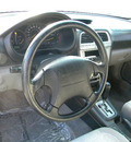 subaru impreza 2002 black wagon outback sport gasoline 4 cylinders all whee drive automatic 92882