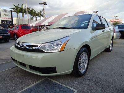 ford focus 2010 light green sedan se gasoline 4 cylinders front wheel drive automatic 33157