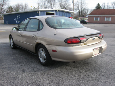 ford taurus 1999 tan sedan se gasoline v6 front wheel drive automatic with overdrive 45840