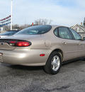 ford taurus 1999 tan sedan se gasoline v6 front wheel drive automatic with overdrive 45840