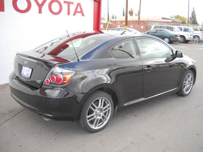 scion tc 2009 black coupe gasoline 4 cylinders front wheel drive standard 79925