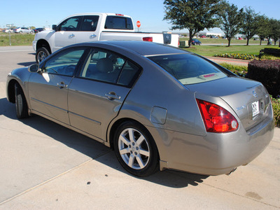 nissan maxima 2004 beige sedan 3 5 sl gasoline 6 cylinders front wheel drive automatic 76018