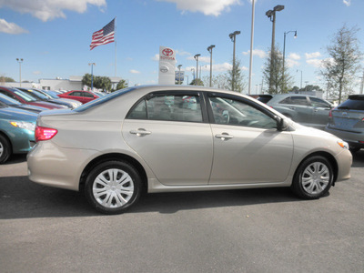 toyota corolla 2009 gold sedan xle gasoline 4 cylinders front wheel drive automatic 34788