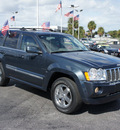 jeep grand cherokee 2007 blue suv overland gasoline 8 cylinders rear wheel drive automatic 33021