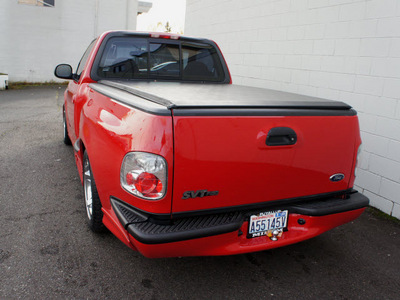 ford f 150 svt lightning 1999 red pickup truck 2wd gasoline v8 rear wheel drive automatic with overdrive 98371