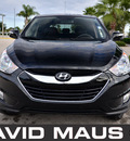 hyundai tucson 2010 black suv limited gasoline 4 cylinders front wheel drive automatic 32771
