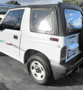 chevrolet tracker 1998 white suv gasoline 4 cylinders rear wheel drive 5 speed manual 34474