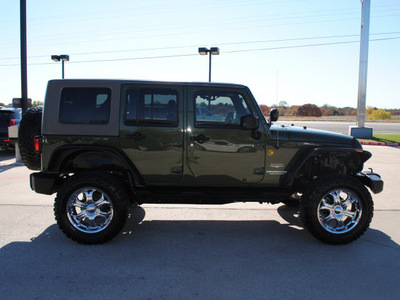 jeep wrangler unlimited 2008 green suv sahara gasoline 6 cylinders 4 wheel drive automatic with overdrive 76087