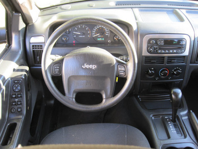jeep grand cherokee 2004 black suv laredo gasoline 6 cylinders rear wheel drive automatic 77379