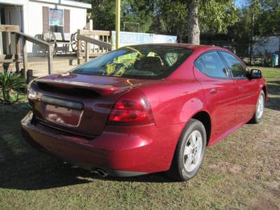 pontiac grand prix 2006 red sedan gasoline 6 cylinders front wheel drive automatic 77379