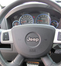 jeep grand cherokee 2008 black suv srt8 gasoline 8 cylinders 4 wheel drive automatic 33884