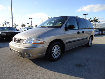 ford windstar 2002 beige van lx gasoline 6 cylinders front wheel drive automatic 33157