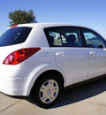 nissan versa 2011 white hatchback gasoline 4 cylinders front wheel drive automatic with overdrive 76018