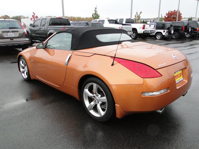 nissan 350z 2006 orange gasoline 6 cylinders rear wheel drive 6 speed manual 98371