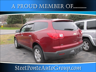 chevrolet traverse 2011 red gasoline 6 cylinders all whee drive automatic 13350