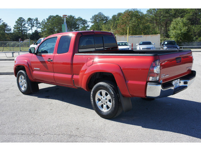 toyota tacoma 2009 red prerunner gasoline 4 cylinders 2 wheel drive 5 speed manual 77388