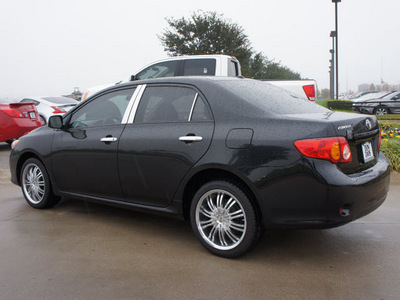 toyota corolla 2010 black sedan le gasoline 4 cylinders front wheel drive automatic 76018