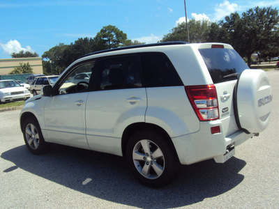 suzuki grand vitara 2009 white suv gasoline 4 cylinders front wheel drive automatic 32901