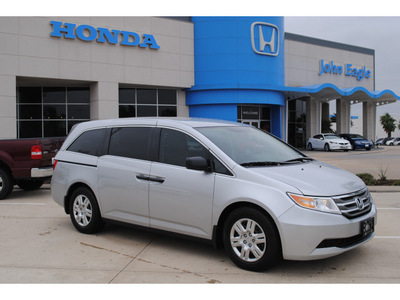 honda odyssey 2011 silver van lx gasoline 6 cylinders front wheel drive automatic with overdrive 77065