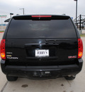 gmc yukon 2007 black suv slt flex fuel 8 cylinders automatic 76087