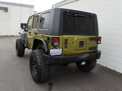 jeep wrangler unlimited 2007 green suv sahara gasoline 6 cylinders 4 wheel drive automatic with overdrive 98371