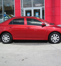 toyota corolla 2009 red sedan le gasoline 4 cylinders front wheel drive automatic 33884