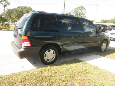 ford windstar 2001 green van lx gasoline 6 cylinders front wheel drive automatic 32778