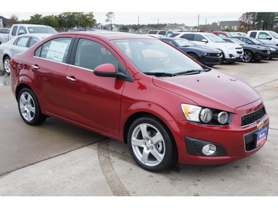 chevrolet sonic 2012 red sedan ltz gasoline 4 cylinders front wheel drive automatic 77090