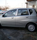 chevrolet aveo 2004 silver hatchback gasoline 4 cylinders front wheel drive automatic 60115