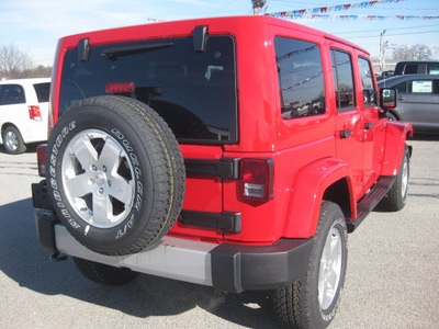 jeep wrangler unlimited 2012 red suv sahara gasoline 6 cylinders 4 wheel drive automatic 62863