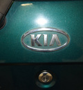kia sedona 2005 dk  green van ex gasoline 6 cylinders front wheel drive automatic with overdrive 76108