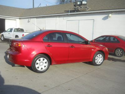 mitsubishi lancer 2009 red sedan de gasoline 4 cylinders front wheel drive 5 speed manual 99212