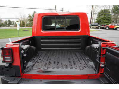 jeep wrangler unlimited 2012 red suv sport custom gasoline 6 cylinders 4 wheel drive 6 speed manual 08844