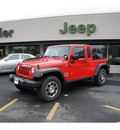 jeep wrangler unlimited 2012 red suv sport custom gasoline 6 cylinders 4 wheel drive 6 speed manual 08844