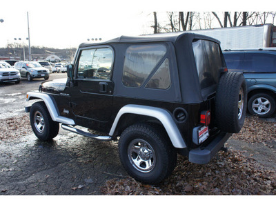 jeep wrangler 2002 black suv x gasoline 6 cylinders 4 wheel drive 5 speed manual 08812