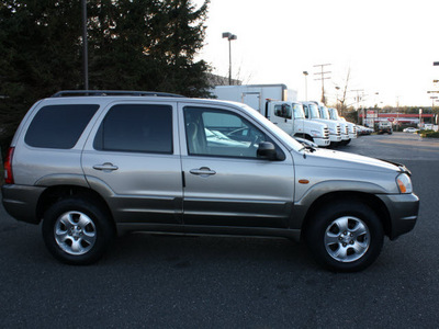 mazda tribute 2001 tan suv lx gasoline 6 cylinders 4 wheel drive automatic with overdrive 07702