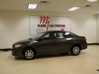 toyota corolla 2011 gray sedan corolla gasoline 4 cylinders front wheel drive 5 speed manual 27707