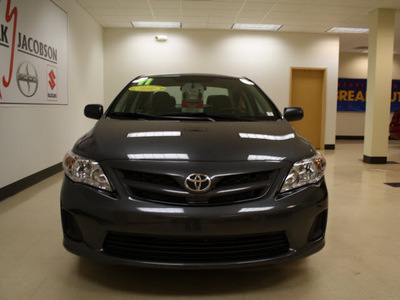 toyota corolla 2011 gray sedan corolla gasoline 4 cylinders front wheel drive 5 speed manual 27707