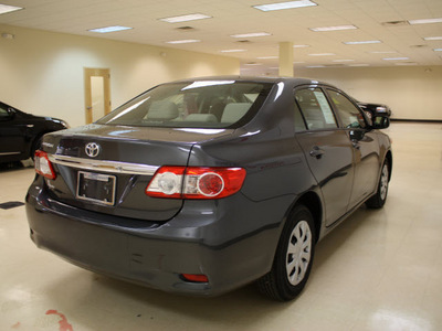 toyota corolla 2011 gray sedan corolla gasoline 4 cylinders front wheel drive 5 speed manual 27707