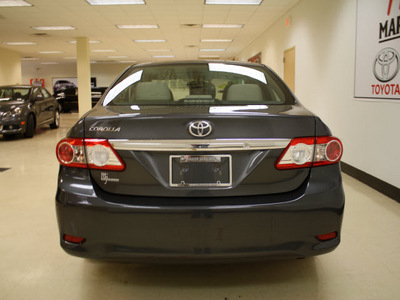 toyota corolla 2011 gray sedan corolla gasoline 4 cylinders front wheel drive 5 speed manual 27707