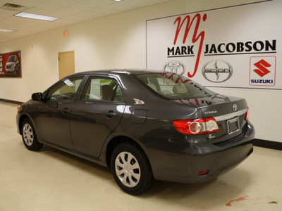 toyota corolla 2011 gray sedan corolla gasoline 4 cylinders front wheel drive 5 speed manual 27707