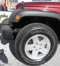 jeep wrangler unlimited 2010 burgundy suv sport gasoline 6 cylinders 4 wheel drive automatic 34731